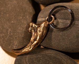 Bronze casting of a velociraptor claw