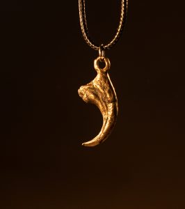 bronze cast velociraptor claw pendant