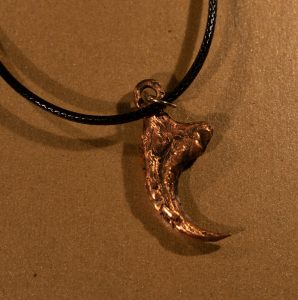 Copper Velociraptor claw necklace