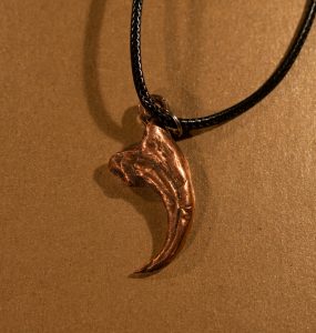 Copper Velociraptor claw necklace