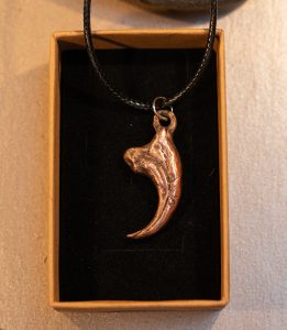 Copper Velociraptor claw necklace